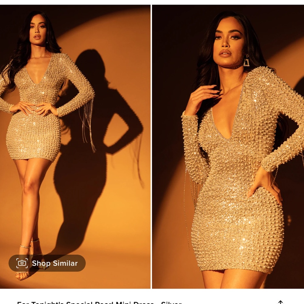 Mini sequin/ Pearl dress with deep v neck